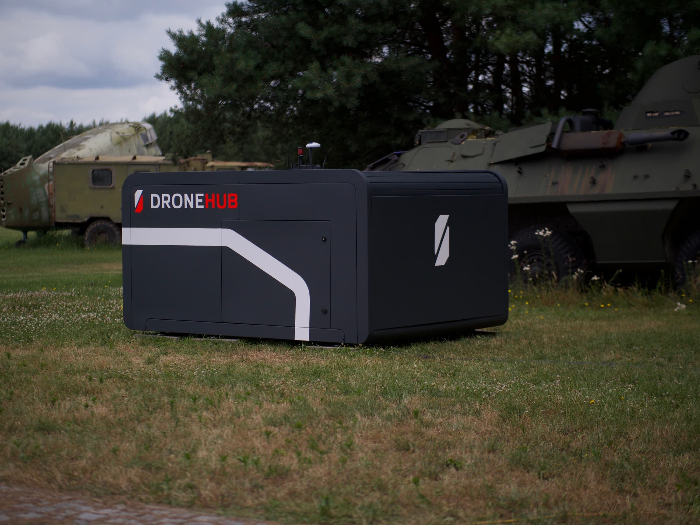 Dronehub monitoring hub deployed trackside, running autonomous inspection patrols across its assigned corridor